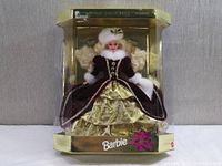 Front view of Special Edition Barbie doll in original sealed box, showing full outfit and packaging.