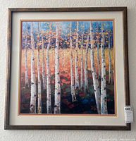 Full view of framed print showing a colorful autumn scene with aspen trees and artist signature.