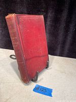 Photo of red hardcover book titled 'History of England for Beginners' showing worn spine and cover.