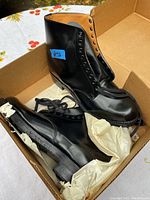 Pair of black leather high-top police boots new in box