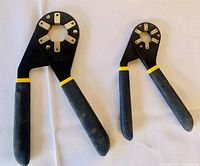 Both large and medium Bionic Wrenches on white background showing overall condition and size difference.