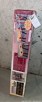 Photo of the boxed Shop Site Folding Flip-Top Workbench showing packaging and product name.