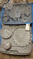 Photo showing assortment of German 24% lead crystal glass stemware, coasters, and large serving tray all with intricate cut patterns.