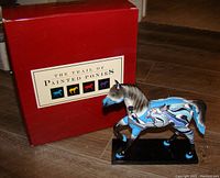 Photo of boxed Trail of Painted Ponies DREAM WARRIOR ceramic horse figurine with red box.