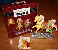 Pony on Parade resin figurine with box and informational booklet shown upright, displaying the full figure and packaging.