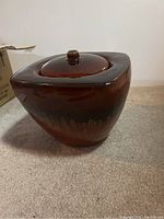 Closed view of the ceramic mini square chestnut fire pot with lid on, showing the glossy chestnut finish.