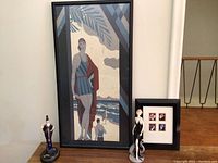 Framed Art Print with two porcelain figurines on either side