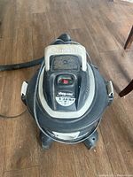 Top view of Shop Vac wet/dry vacuum showing the handle and power switch.