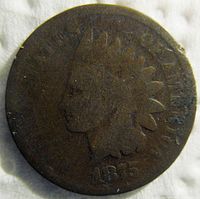 Obverse side showing Lady Liberty with headdress and date 1875