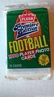 Single unopened pack of 1990 Fleer Premiere Edition Football Player Photo Cards showing front design and details