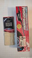 Photo of Genuine Leather Chamois in its branded packaging and Turbo-Wash hose attachment in original box.