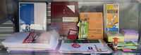 Overview of paper pads, notebooks, correction pens, glue stick, post-its and tab pages