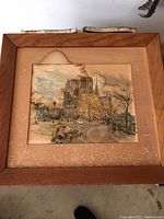 Top view of the wooden bar box with watercolor artwork showing water damage and stains