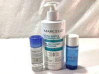 Photo of the 350ml Ultra Gentle Cleansing Gel with pump dispenser and 50ml bottles of 3 in 1 Micellar Solution and Gentle Makeup Removal on a white background.