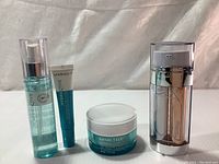 Full view of all four Marcelle skincare products in the lot on white backdrop
