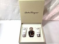 Set in original cream box showing all three items: Eau De Parfum, Bath & Shower Gel, and Body Lotion