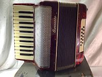 Front view showing keyboard, grille and Sorrento logo