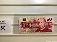 Front view of 1988 Canadian $50 dollar bill showing portrait of William Lyon Mackenzie King and security features.