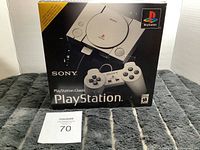 Original PlayStation Classic box with printed console and controller image.