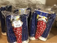 Five packages, each containing three reusable ice bags for therapy, with two blue and one red star-patterned bag visible per set