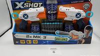 Full set of two Zuru X-Shot MK3 dart blasters in original packaging with foam darts and target canister.