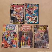 Lot of 5 comic books including 2 New Universe PSI Force and 3 Justice League Europe issues showing front covers.