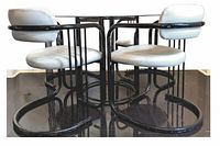 Side view of tubular metal frame and white vinyl cushioned chairs showing wear and missing end caps