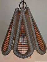 Front view of ceramic cane style pendant light showing the textural details and cane panels