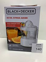 Box packaging showing Black & Decker branding and product image with features noted such as 32 oz capacity and dual-purpose cone