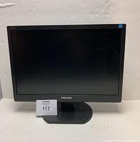 Front view of Philips 19 inch monitor on black stand with 'Philips' logo and model number 190VW visible.