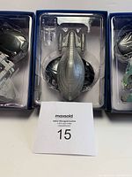 Close-up top view of the U.S.S. Voyager Armoured ship in its original protective plastic tray and display stand.