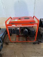 Front and side view of red Multiquip 6000 portable generator showing control panel, engine, and frame.