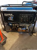 Front and side view of Tsurumi TPG3600H-DX generator showing control panel, power outlets and metal frame.