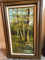 Framed oil painting of forest with birch and other trees, signed Cantrell bottom left, showing full piece and frame.