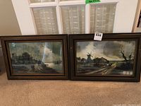 Both framed prints side by side showing landscapes and frame condition
