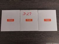 Three white boxes with the orange Tribit logo on the front, unopened.