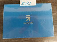 Blue box with Renpho logo, sealed new item packaging