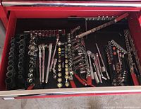 Overview of tool drawer showing sockets, ratchets, extensions, and torque wrenches