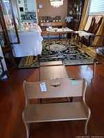 Wooden bench with heart cutout backrest, front view