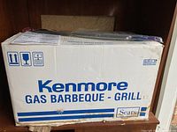 Kenmore branded cardboard box for gas barbeque grill with Sears logo.