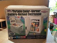 Box of Koolatron Portable Cooler-Warmer showing front image and product details