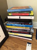 Stack of art and design books with visible titles, showing condition and spine details.