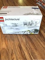 Closed original box on wood floor