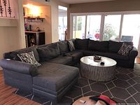 Assembled sectional sofa from front in living room, showing overall layout