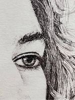 Close-up of woman's eye and detailed etching lines.
