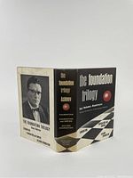 Front and back panel of the dust jacket showing title and author