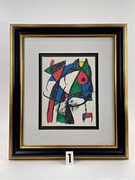 Front view of framed lithograph showing abstract composition and frame