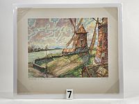 Front view of the offset engraved print of windmills laid loose on acid-free board with photo corners inside a protective shrink-wrap.