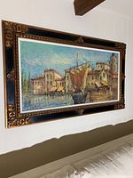 Alternate frontal angle showing the painting with a clear view of colors and frame design.