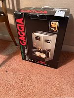Front view of original box showing Gaggia branding and machine image.